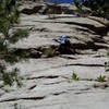 Ken Parker getting his brain warmed up to the puzzling crux moves.