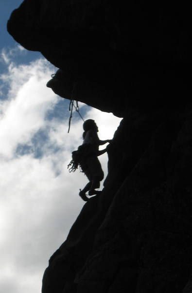 Yvonne at the start of the 5.11 roof.