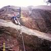 Ross gets started on the second crux of Burger Madness (10b). Photo by T. Bubb 8/06.