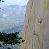 Unknown climber hiking the crux.