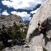 Bouldering on Echo ridge. Flagpole Peak and Corkscrew Area can be seen in the left background.<br>
Photo by Blitzo.