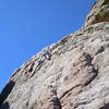 Jaclyn, 8, soaking up the sun on a South face TR.