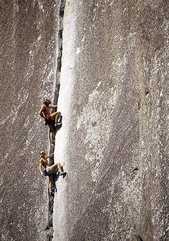 Rick Cashner and John Bachar, free soloing "Reed's Direct", 1982.<br>
Photo by Blitzo.