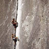 Rick Cashner and John Bachar, free soloing "Reed's Direct", 1982.<br>
Photo by Blitzo.