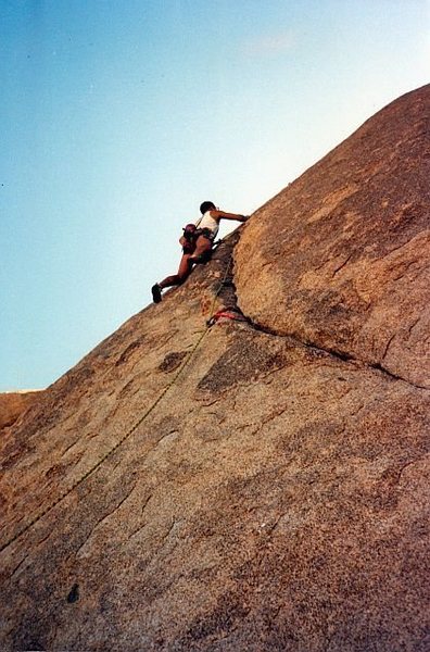 Nearing the end of the crack on Bella Lugosi (5.11c), Joshua Tree NP<br>
<br>
Photo by Tim Fearn (Fall 1987)