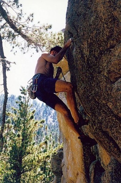 Making the clip just after the dyno on Particle Acceleration (5.12a), Keller Peak
<br>

<br>
Photo by Tyler Logan (July 1996)