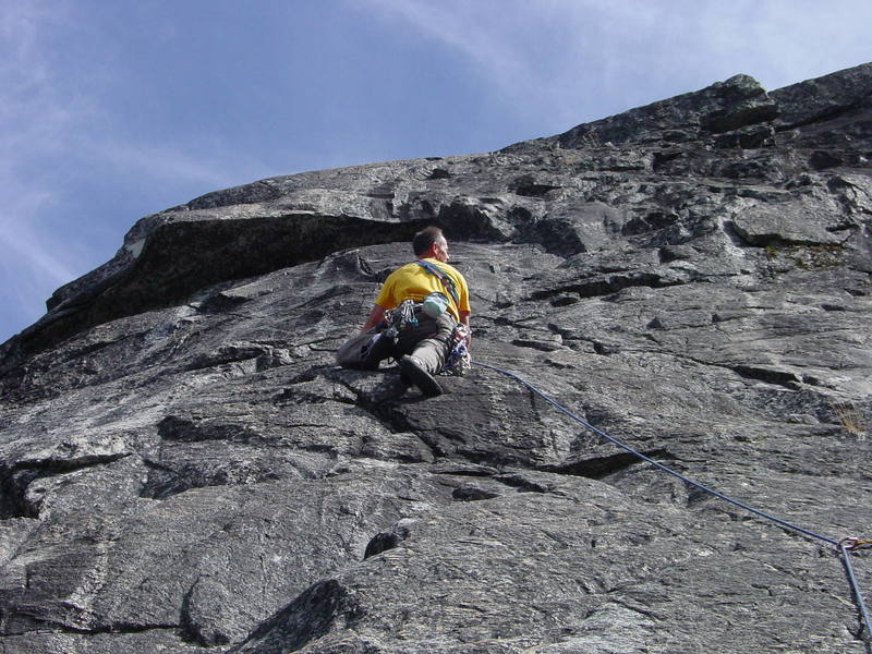 Paul just reaching second bolt. 3rd and 4th bolts can be seen up and left reaching the overhang.