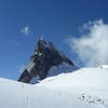 View of Pigeon Spire from the northeast. The West Ridge route follows the right skyline of the spire.