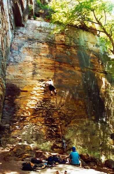 Climber on the route Buckeye Testpiece. The dihedral to the left is Strick 9 and the chalk spots to the right are Toxic Avenger.