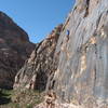 Mike leads Topless Twins with the backdrop of Mescalito in Pine Creek Canyon behind.