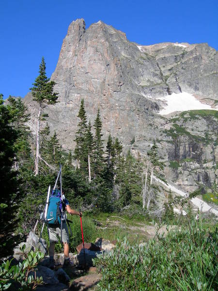 Diana Laughlin heads up toward Notchtop Spire on her way to ski Ptarmigan Glacier.