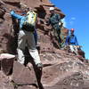 Ben Williams and two other climbers scrambling down the upper half of the Northeast Ridge route, North Maroon Peak.