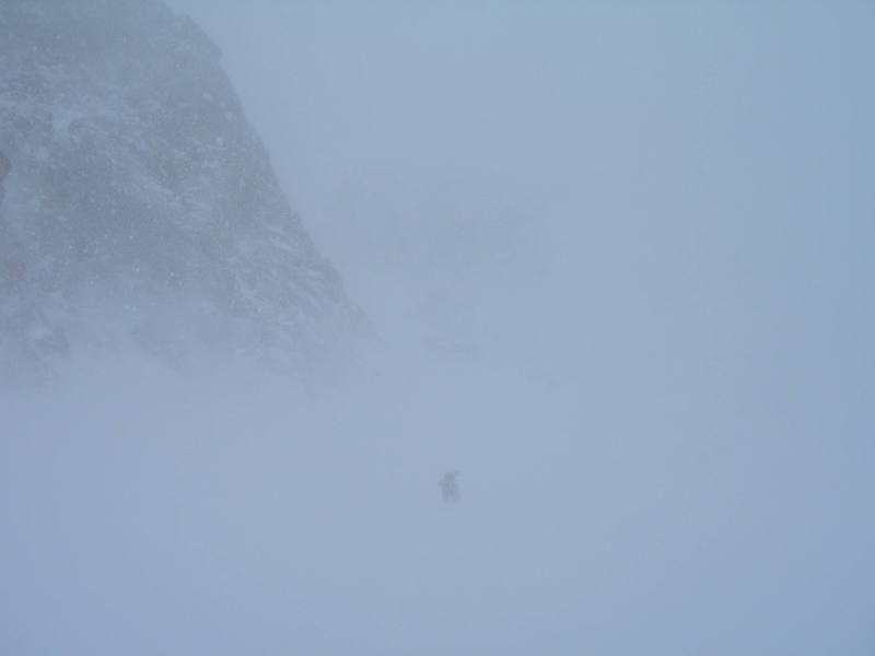Ben Williams nears the base of the gully in a March whiteout.