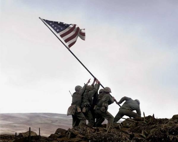 Raising the flag on Iwo Jima.