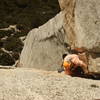 Charlie, rounding the roof and arriving at the second Belay stance of Open Book<br>
