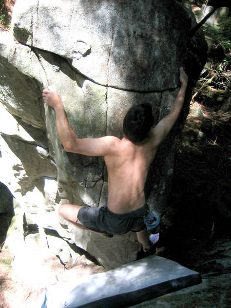 Leon working up the face of the elephant boulder