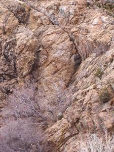 There is an ice (possibly mixed) climb on the black water streak in the winter.  Transformer climbs the face to the right of the black streak.  There are two short but steep routes on the triangle-shaped headwall on the far right.