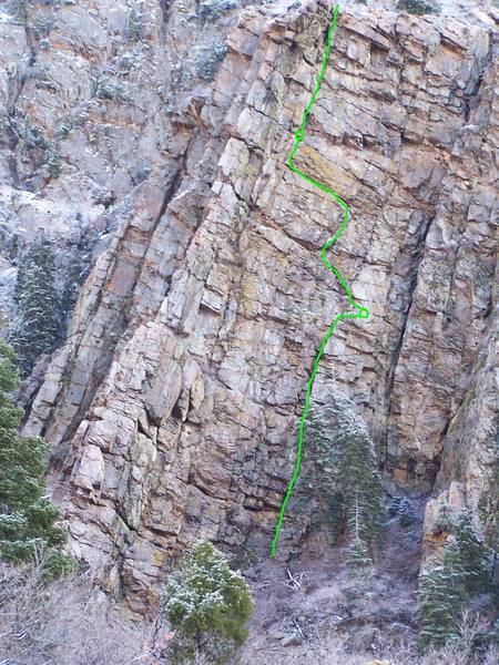 First pitch is the same for Straight Up.  Use Weed Killer anchors for first belay.  There are three cracks that can be used for the traverse, the middle route is marked, the lower leads to the cave belay on Outside Corner.  Second belay is just under the roof with the chimney.