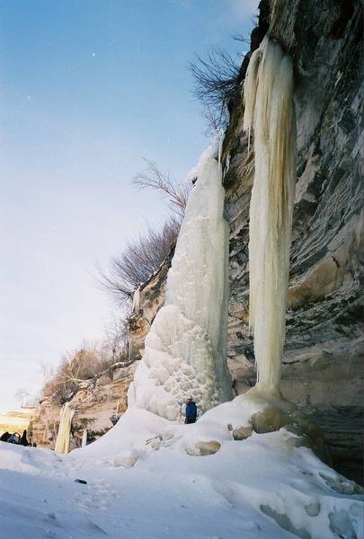 This photo is take from the base of Spray Falls. White Fang is in the foreground. I'm standing next to Little Guy, and Brownie Surprise is the yellow ice in the background.