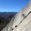 A pair of climbers move out on the next pitch of Great Arch, while another leader goes up Bombay Groove.