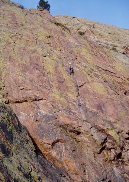 Unknown climber looking pretty small near the top of P2.