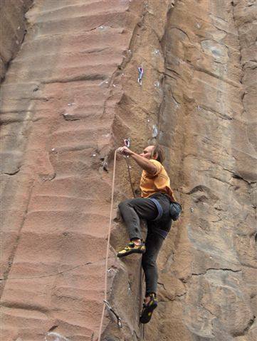 Clipping the 3rd bolt on the third ascent of Big Tuna.