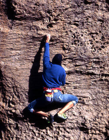 Pocket climbing.<br>
Photo by Blitzo.