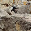 Luke on the real crux--moving up from the jug. There are a couple of ways to do this--Luke is stemming, I do it with right hip into the corner and both feet out left. You're leaving a good rest with a big jug and moving above small gear, both of which add subjective difficulty.