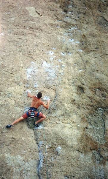 Joel Anderson just beginning the crux of this beautiful route. The section right above his head with all the chalk spots is the tricky crux.