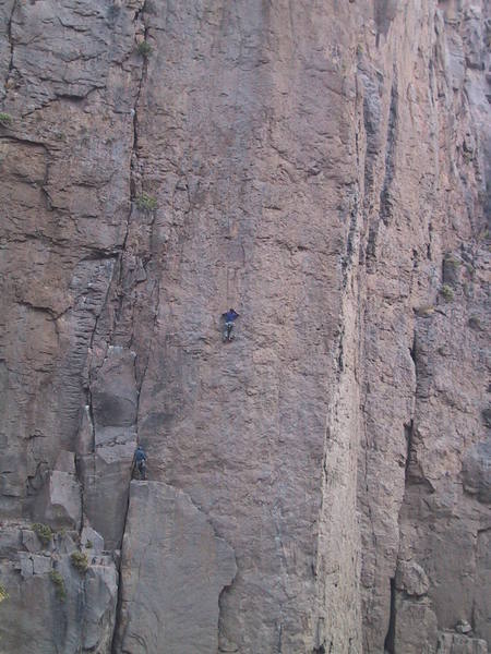 The lone crap shooter is taking it easy, belaying the second up TD.  Note: the belayer is in the recommended belay stop.