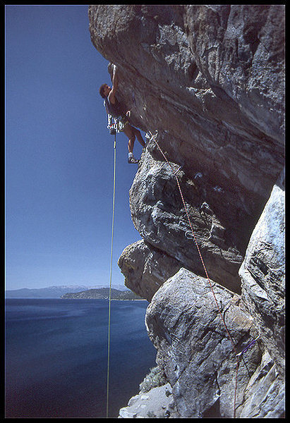 Jay Smith on an unnamed first ascent at Cave Rock, Nevada.<br>
Photo by Blitzo.