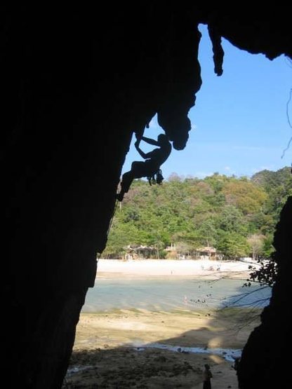 Bryce took this sweet silouette shot of me pulling on stalagtites of all sizes on Happy Island.