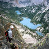 At the top of the descent gully with Saddleback Lakes and camp visible below.