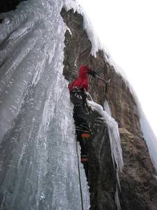 150' of delicate and steep ice above the bridge.  The name might have been Paranoia, but I'm not sure. In grade 5 shape.