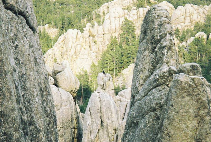 Unknown climber on the summit of waves. This photo was taken from on top of the huge chockstone in the Chopping Block area.