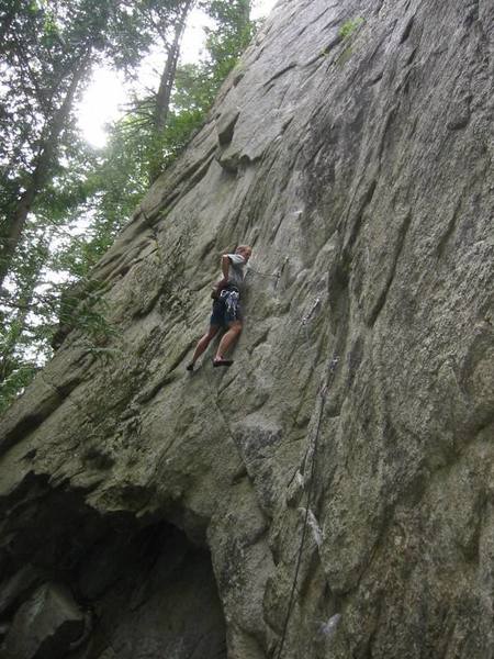 Kevin Vallely through the first crux of Jeff and the Giant Reach, but with the reaches and underclings looming above.