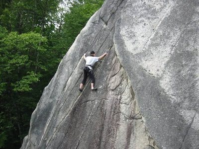 Nicky Hastings in the crux of Wobbler.<br>
<br>
The diagonal feature to the right is Desperado.