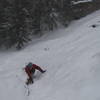 Approaching the base of the gully and the start of the climb.  The start of the First Flatiron rock climb is down and to the right. 