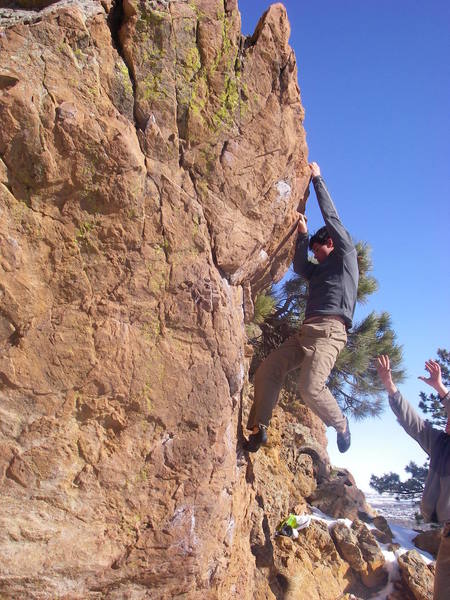 Robbie hanging onto Corner Rock, Andy spotting.