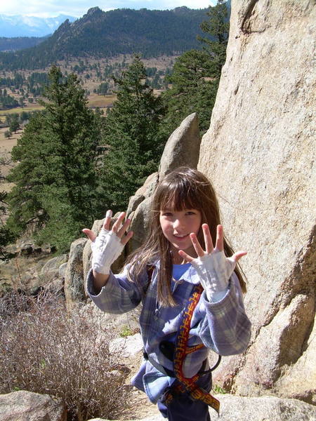 Teaching 'em how to climb crack on Knee Catcher, a crack that was a challenge in blowing snow last season.  Jaclyn, 8.  TR no falls.