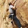 Craig Harding working thru the lower crux.