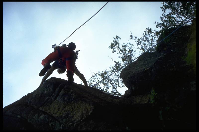 Simon Jenkins grappling the crux of "Strategies for Survival" E1 5b (5.10b), Glen Lednock