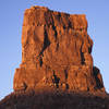 The rarely climbed north face of Eagle Plume Tower at sunrise.