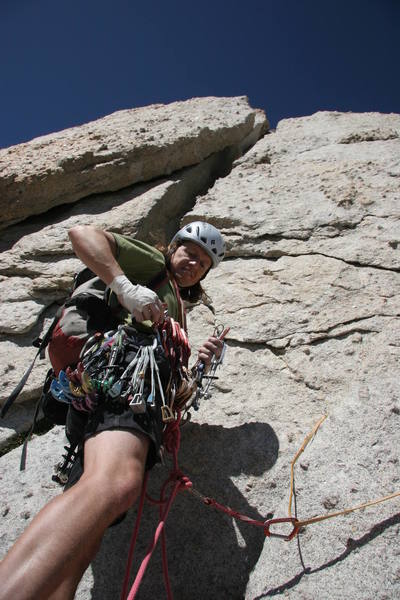 Below the chimney pitch, sorting out gear.