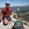 Steve on the summit of Cathedral Peak with Tuolumne Meadows in the background