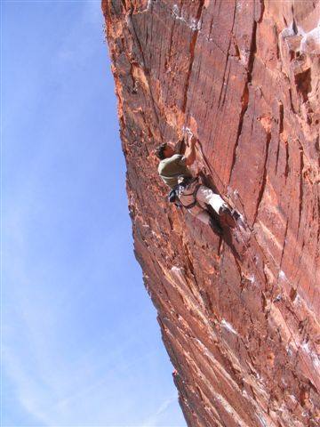 Crimping down on Aftershock 12b at the Tsunami Wall.