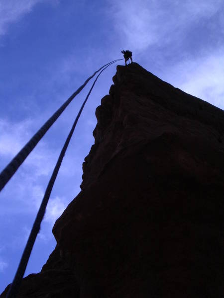 Travis Coster rappeling the Colorado Northeast Ridge. 