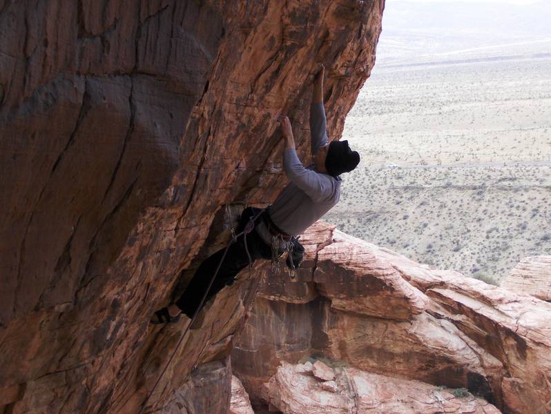 Craig Harding setting up for the crux on Sandman.