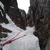 Feb '07. The upper section. There was a short rock traverse (left) to a snow ramp after the ice ended.  Bring tricams, a small selection of cams, and be prepared for some loose rock. 