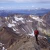 Doug Wall nearing the top of the Southwest Ridge.<br>
<br>
Telluride Ski Area, Lizard Head Peak, and the Wilson group are visible in the background.